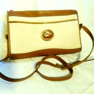 Dooney and Bourke rich leather shoulder bag beige and golden brown.